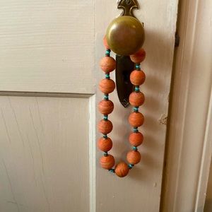 Orange and turquoise bead necklace